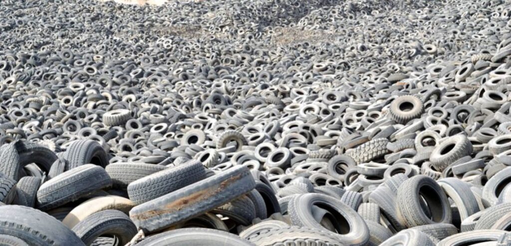 Waste Tyres being baled for export to India