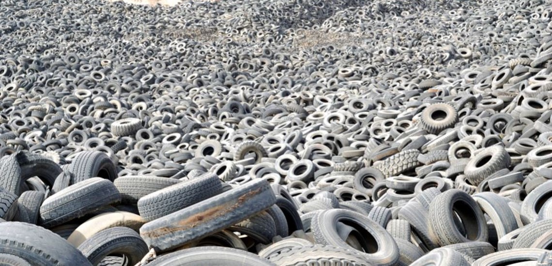Waste Tyres being baled for export to India